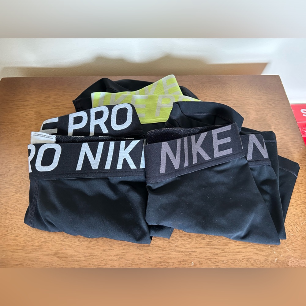 3 pairs of Nike Pro spandex